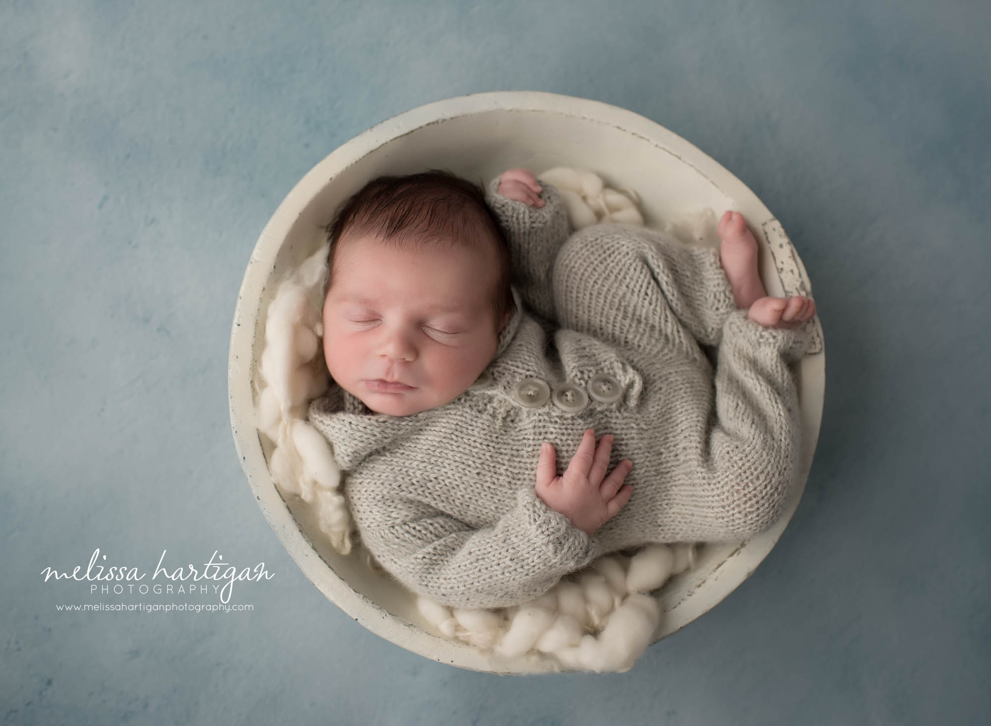 newborn baby boy wearing light grey knitted outfit posed in white wooden bowl with cream layer CT newborn Photography