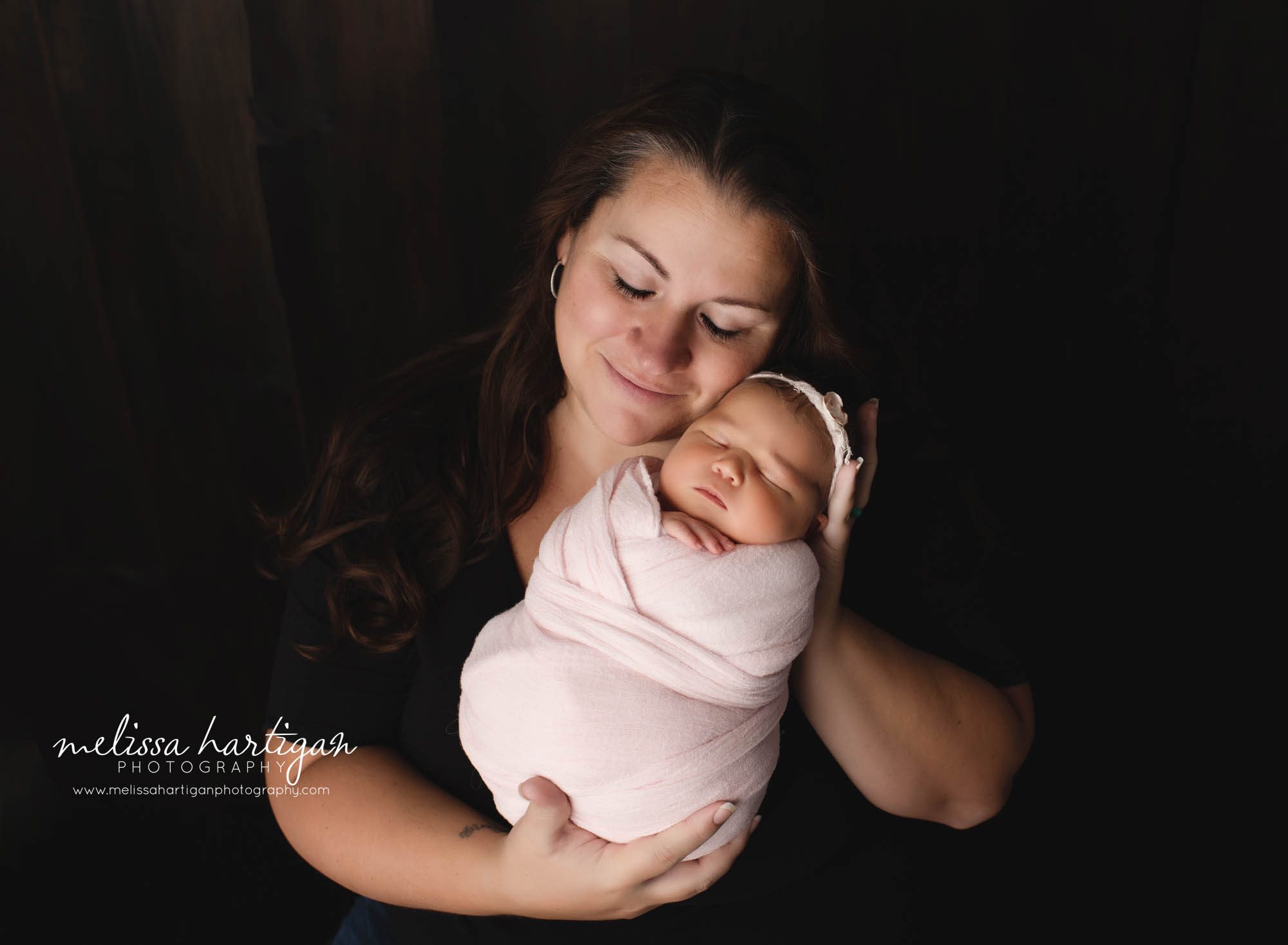 mom holding baby girl newborn photography CT session