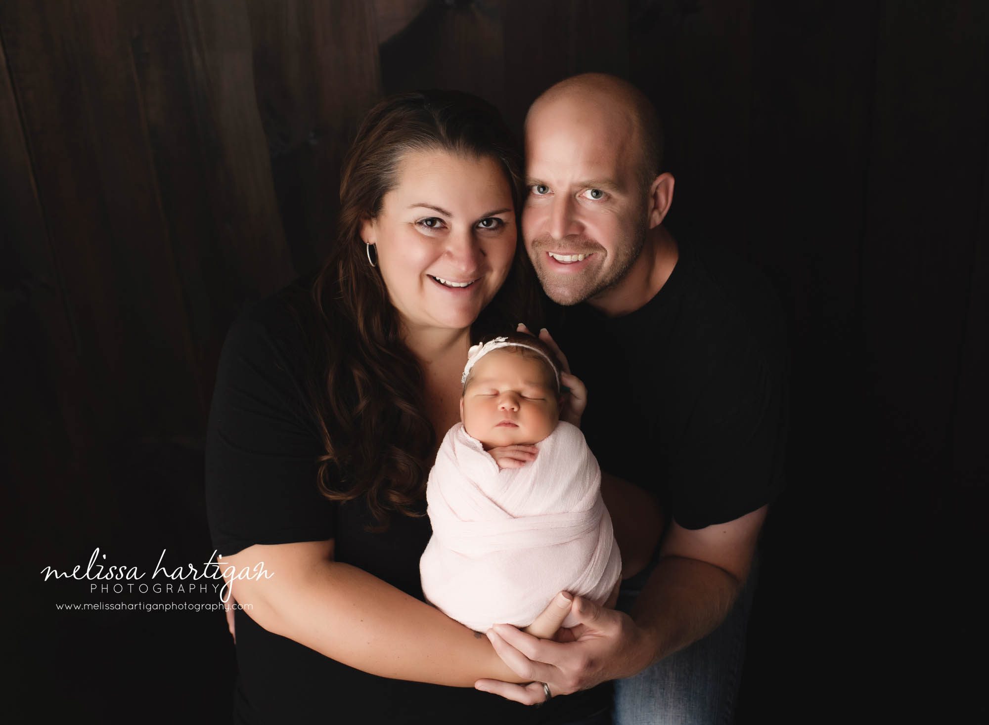 mom dad and newborn baby girl family photo pose newborn photographer CT