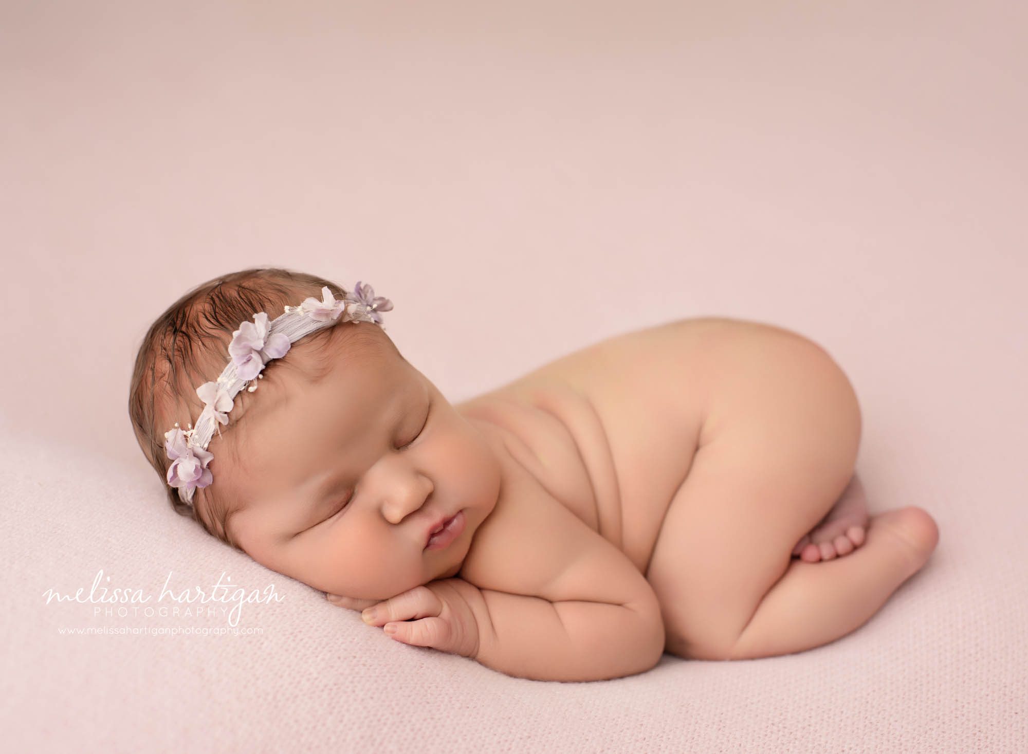 newborn baby girl posed on tummy bum up pose newborn photography CT