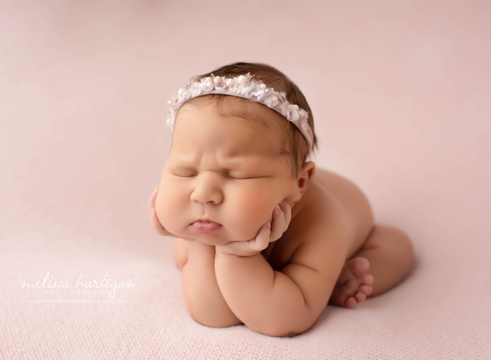 newborn baby girl posed froggy pose newborn photography