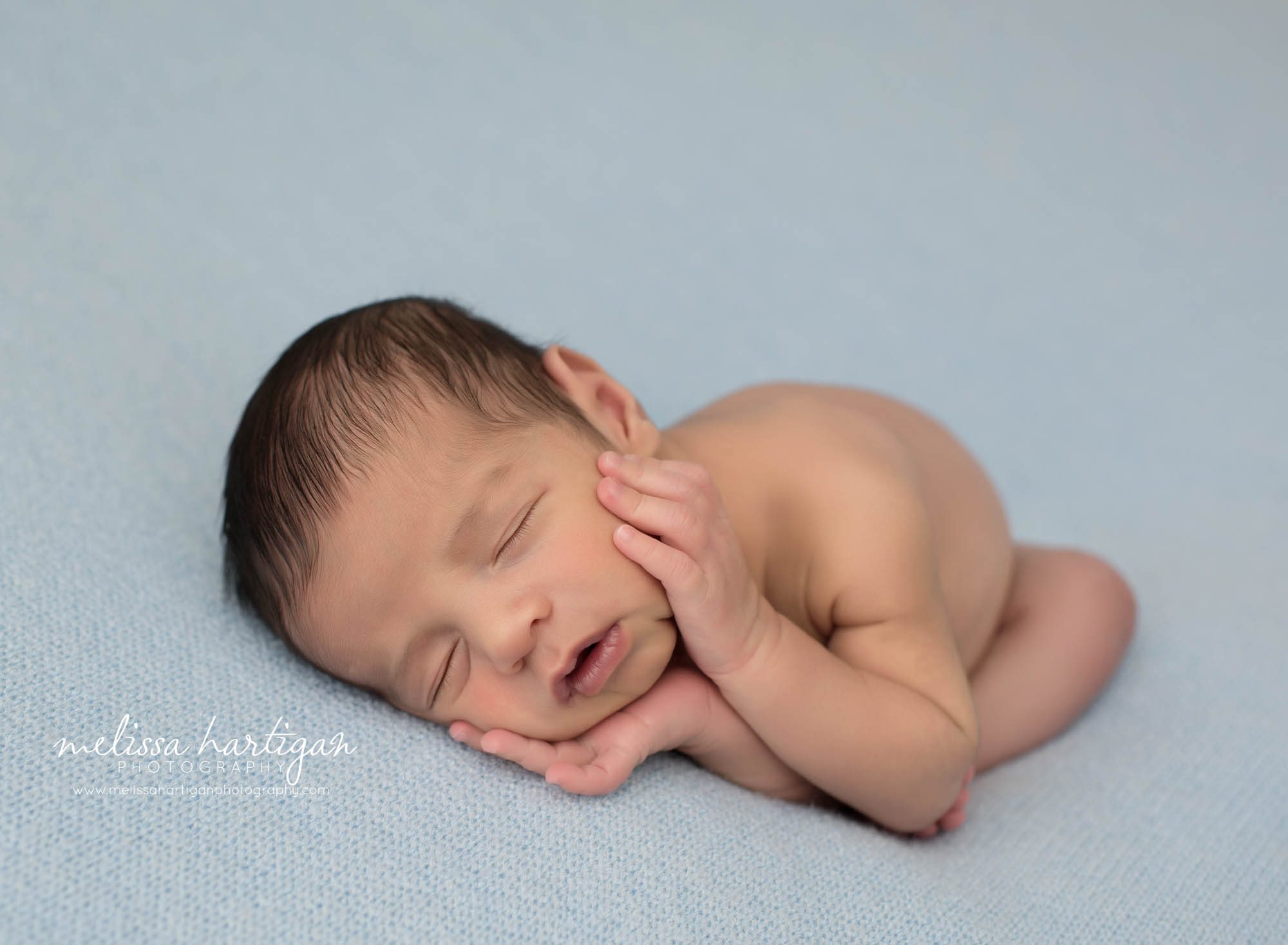 newborn baby boy posed timber pose newborn photography session connecticut newborn photographer