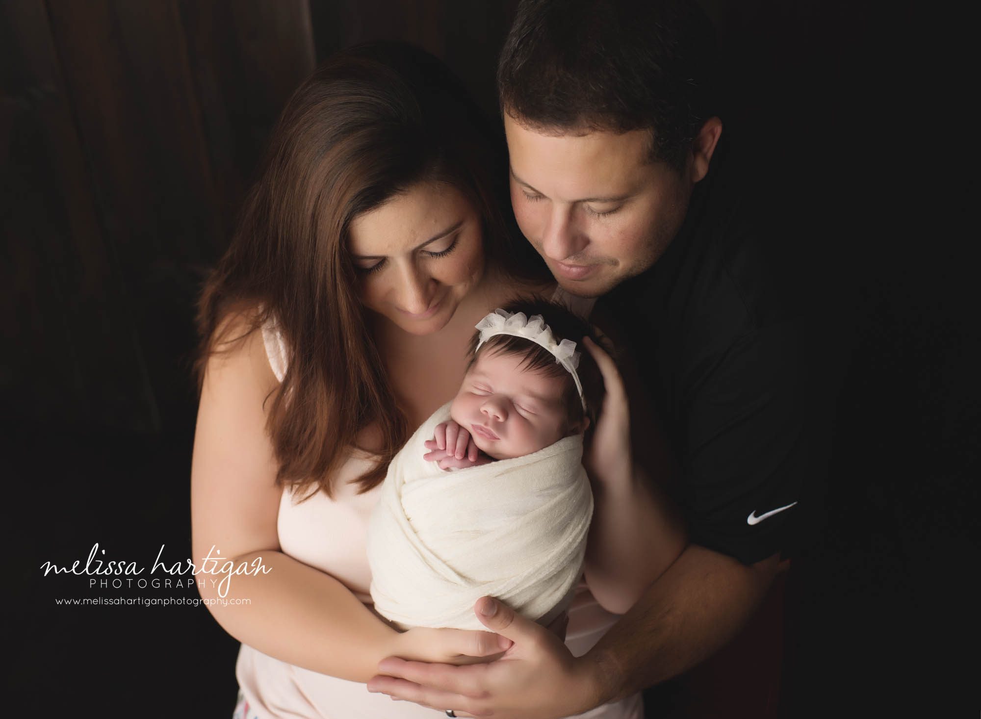 mom dad and newborn baby girl family photo CT newborn photographer