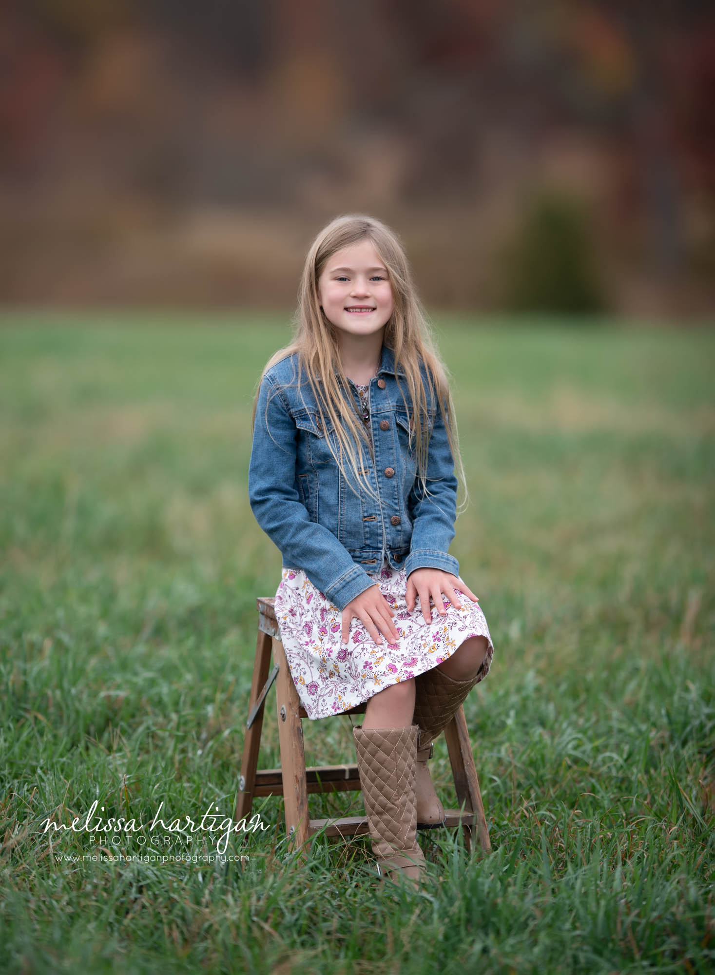 girl sitting on stool in field family photography tolland CT
