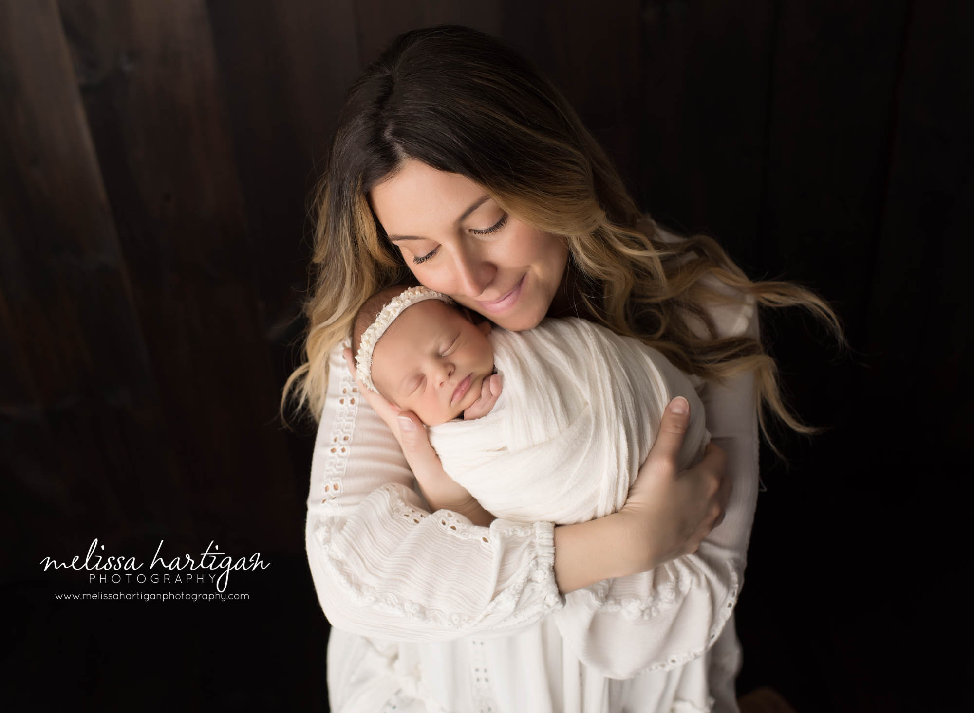 mom holding baby daughter mama and baby pose newborn and family photography CT