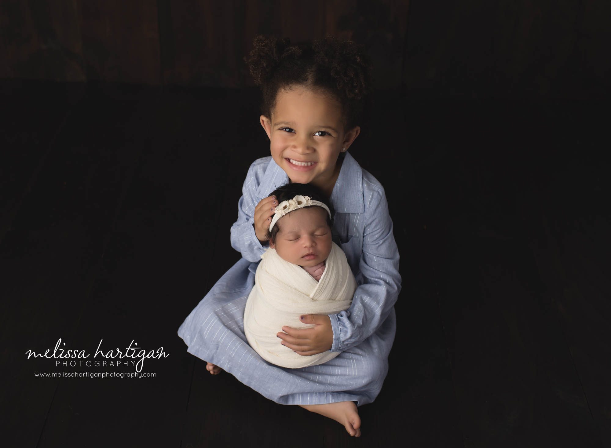big sister and newborn baby girl wrapped sibling connecticut newborn photographer