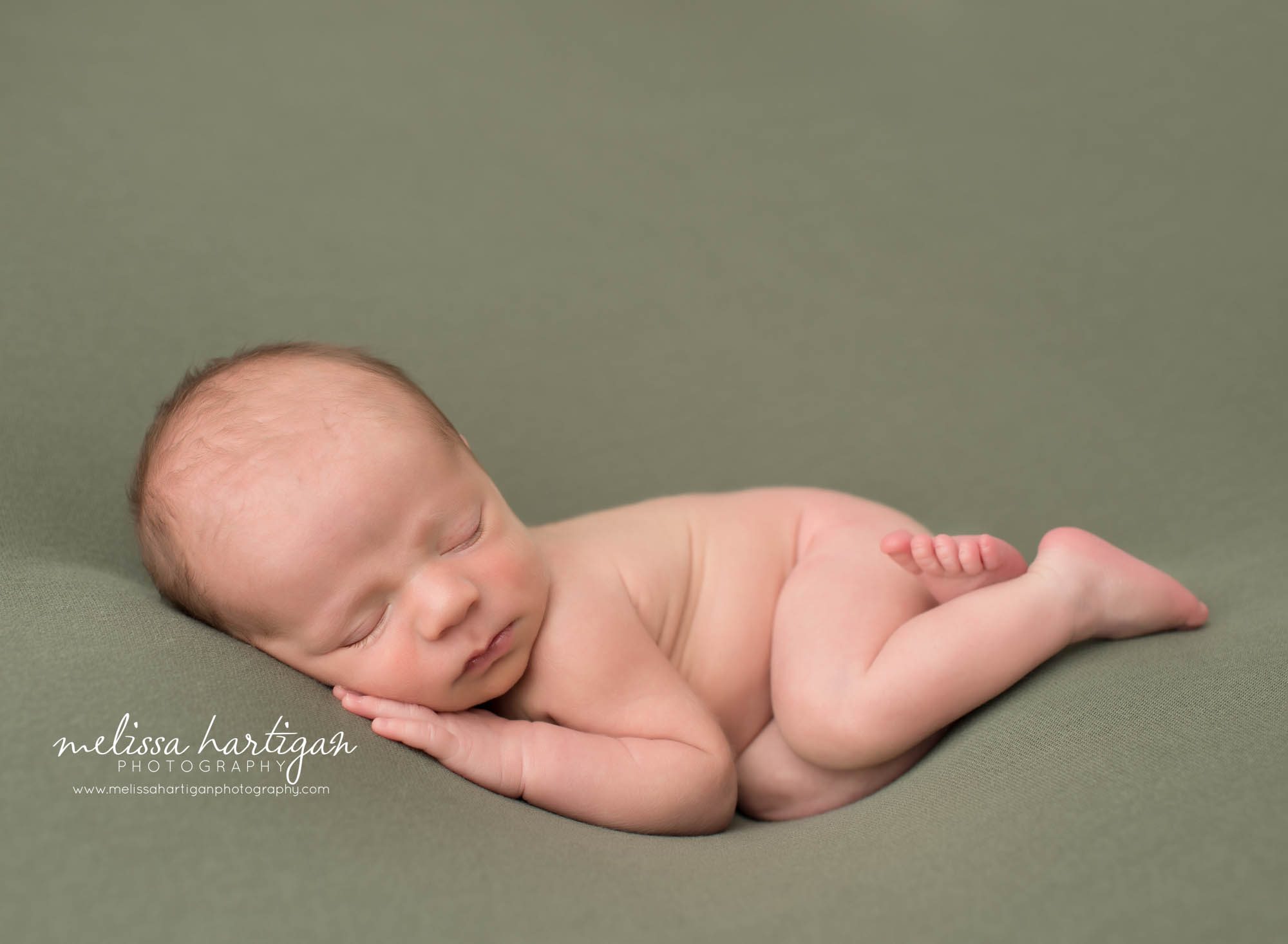 newborn baby boy posed on side sleeping newborn photographer CT
