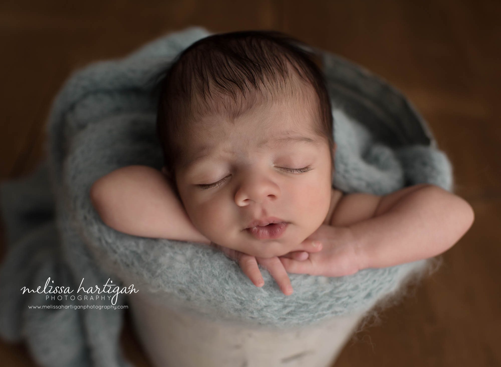 newborn baby boy posed in bucket sleeping manchester CT newborn photographer