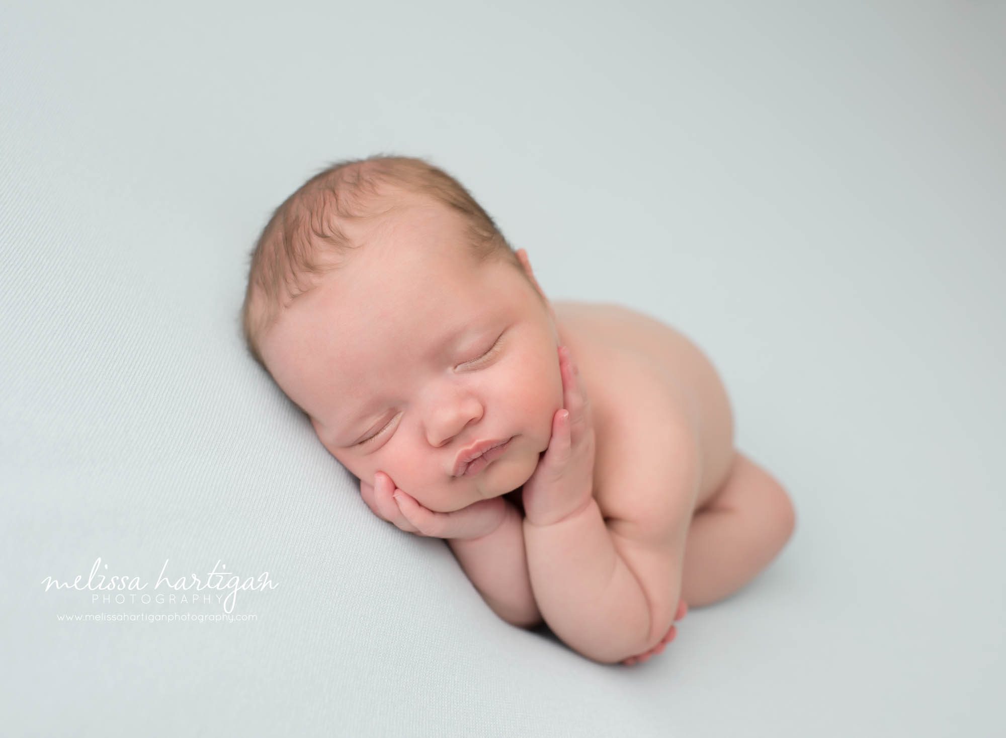 newborn baby boy posed timber pose newborn photography melissa hartigan photography CT newborn photographer