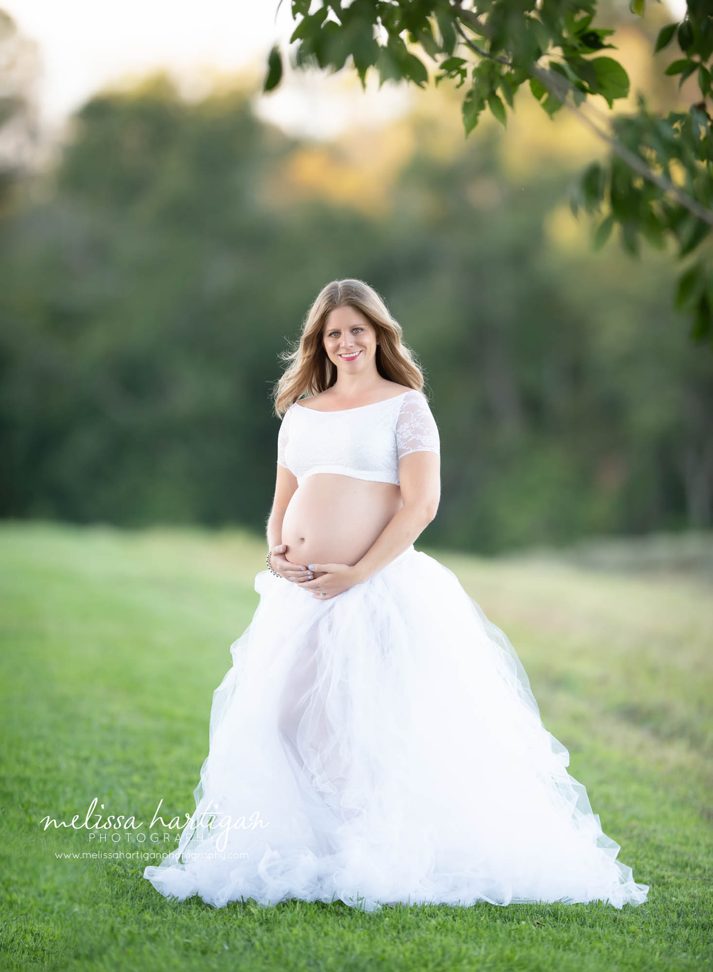 mama to be wearing 2 piece maternity top and skirt pregnancy photography east windsor