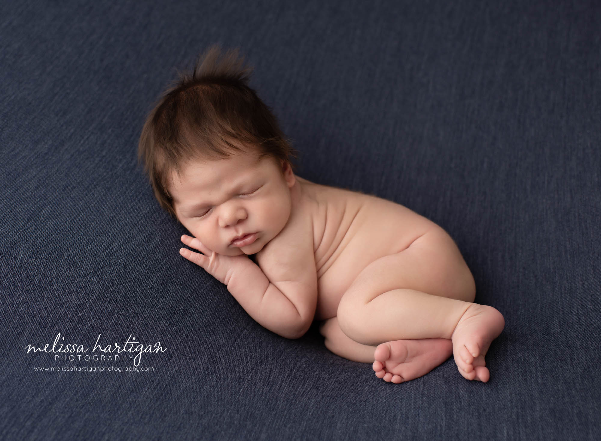 newborn baby boy posed on tummy side sleeping newborn photographer vernon ct