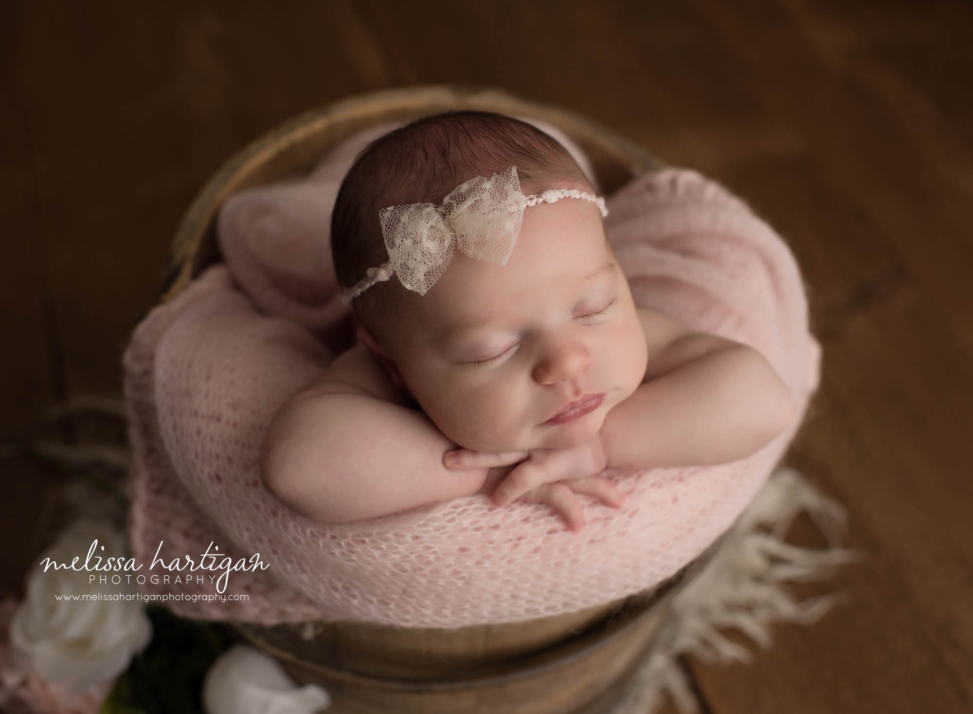 newborn baby girl posed in barrel bucket newborn photographer CT