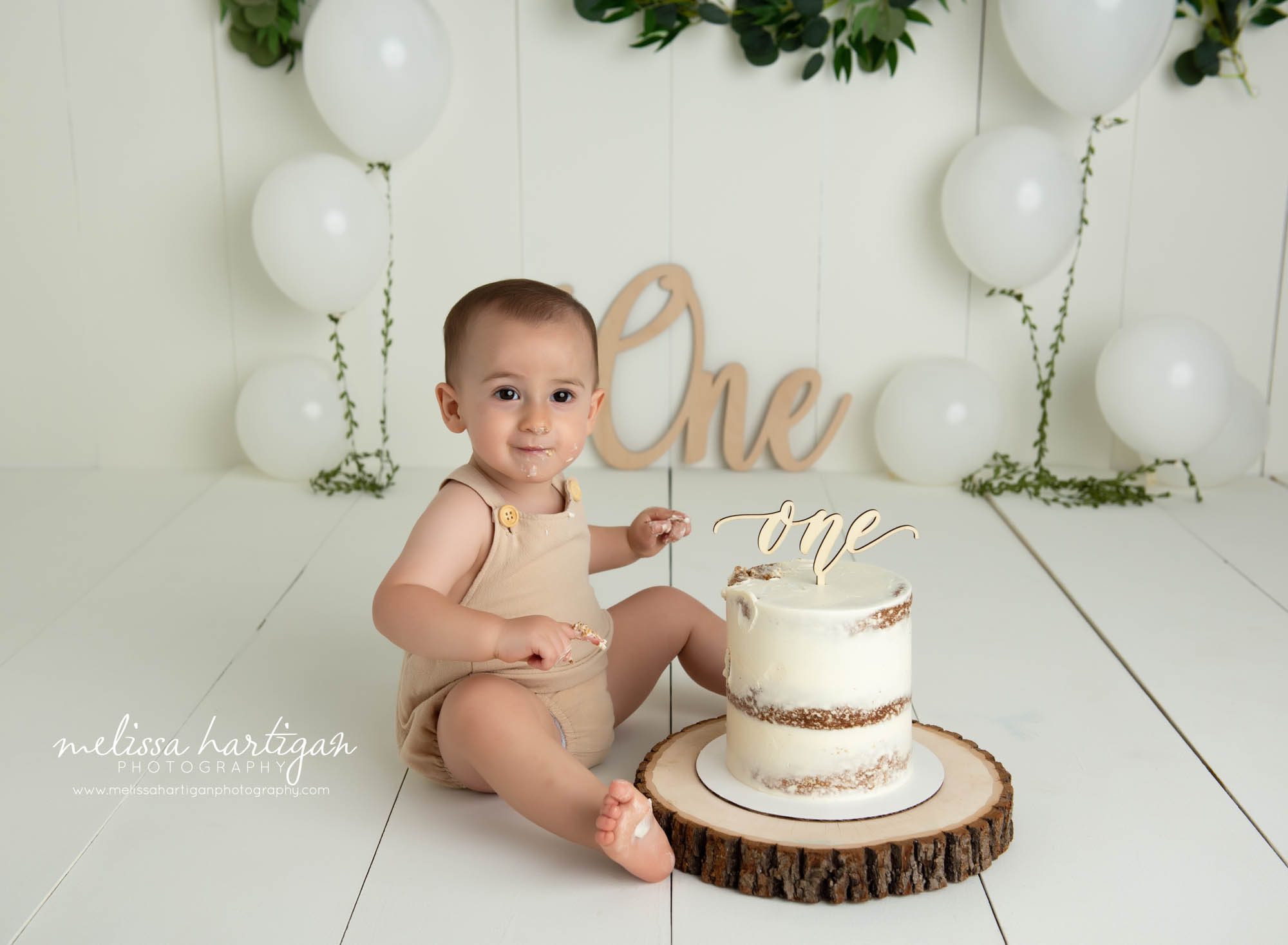 baby boy sitting in front of cake smash cake Stafford springs baby photography