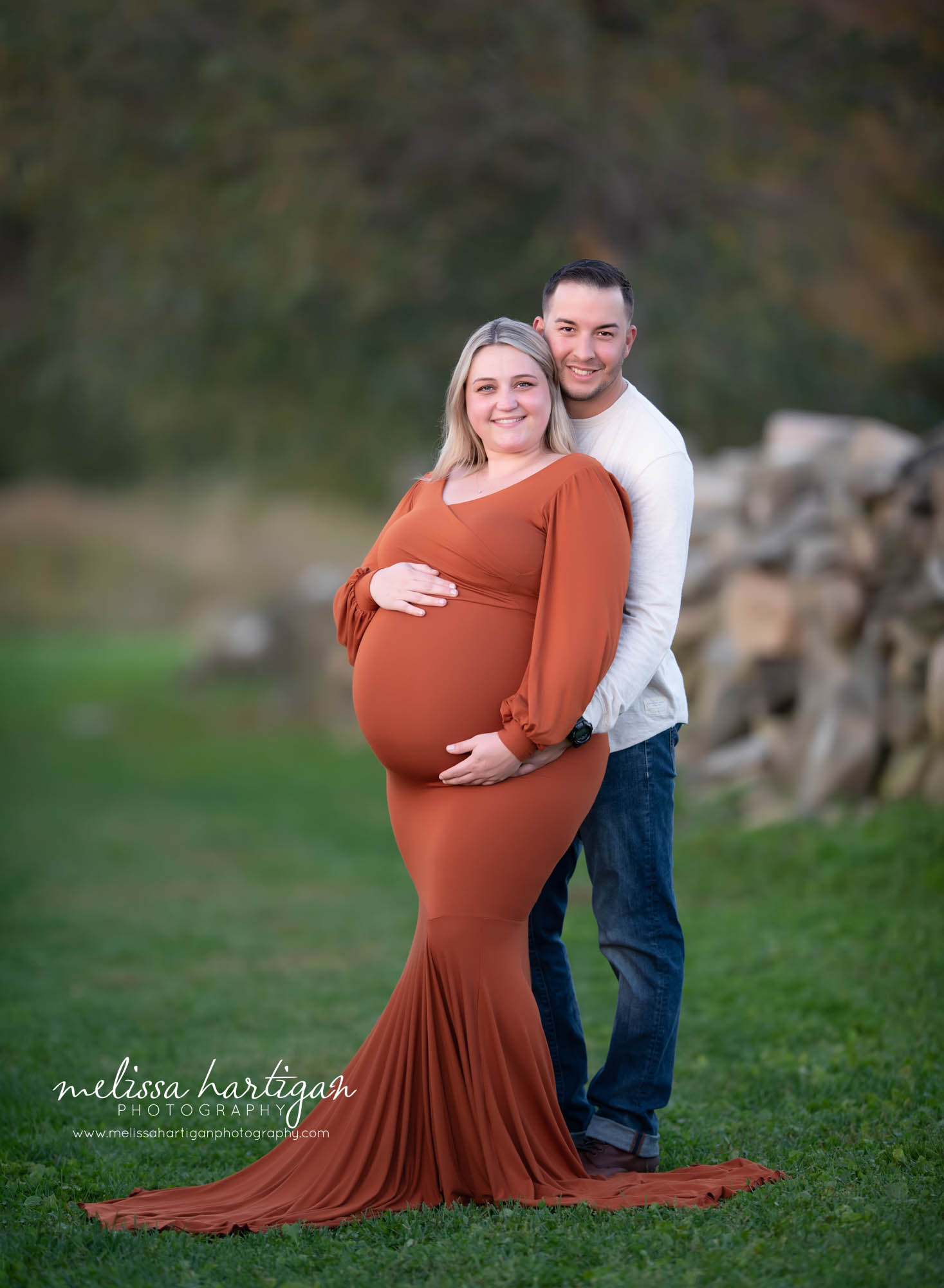 expectant couple holding baby bump fall outdoor maternity pictures maternity newborn photography MA