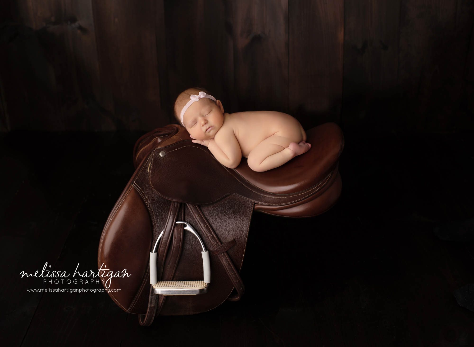 newborn baby girl pose don saddle composite photography image newborn photography canton ct