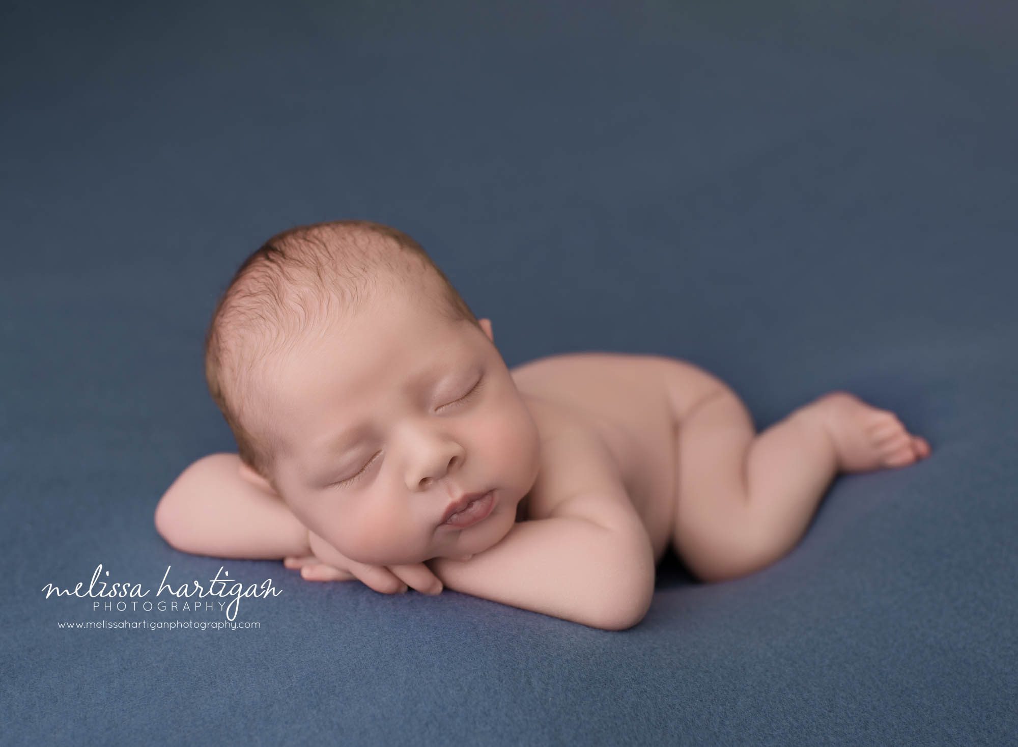 newborn baby boy posed on tummy sleeping newborn photographer unionville CT