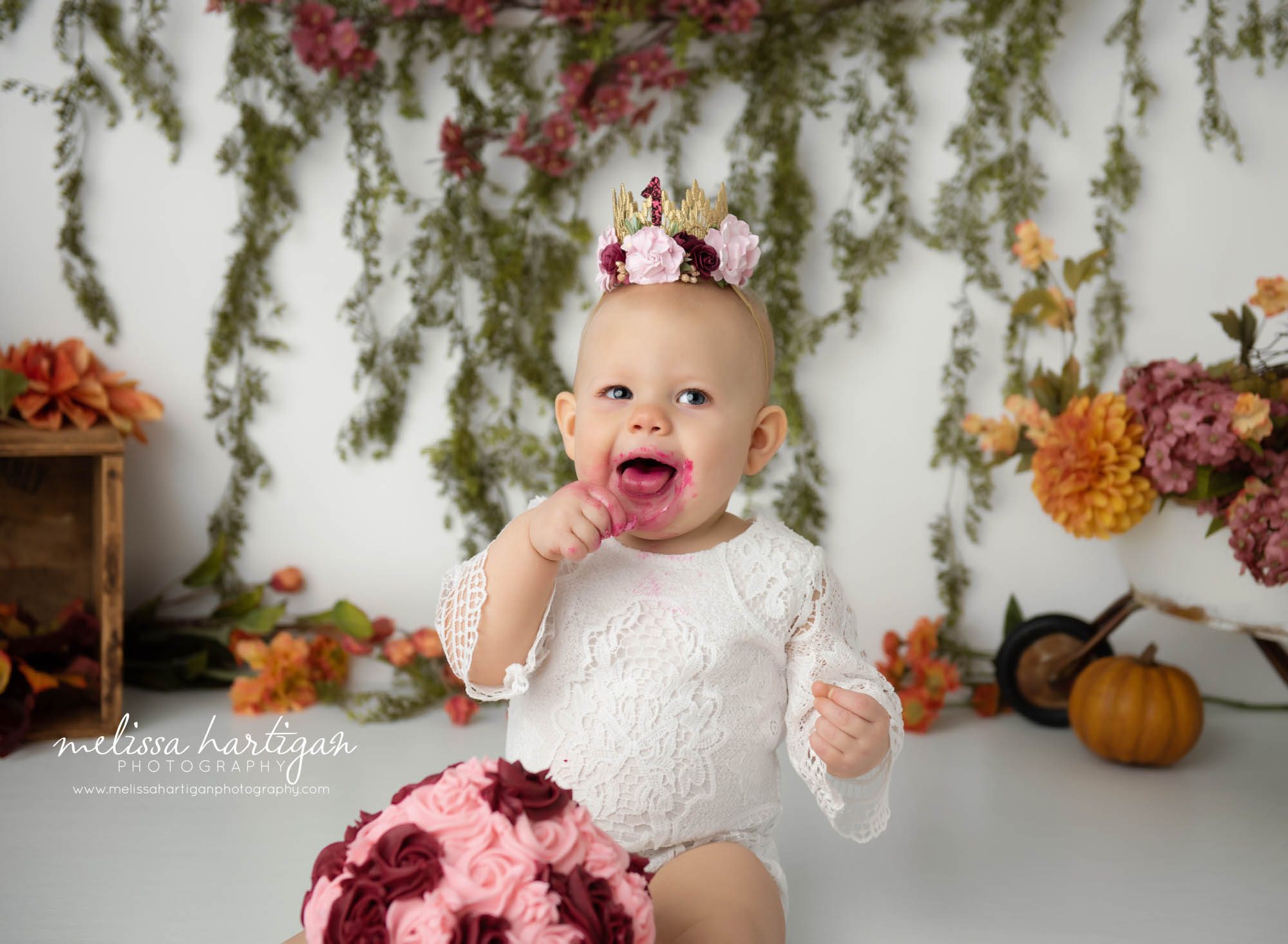baby girl eating cake happy CT baby milestone photographer