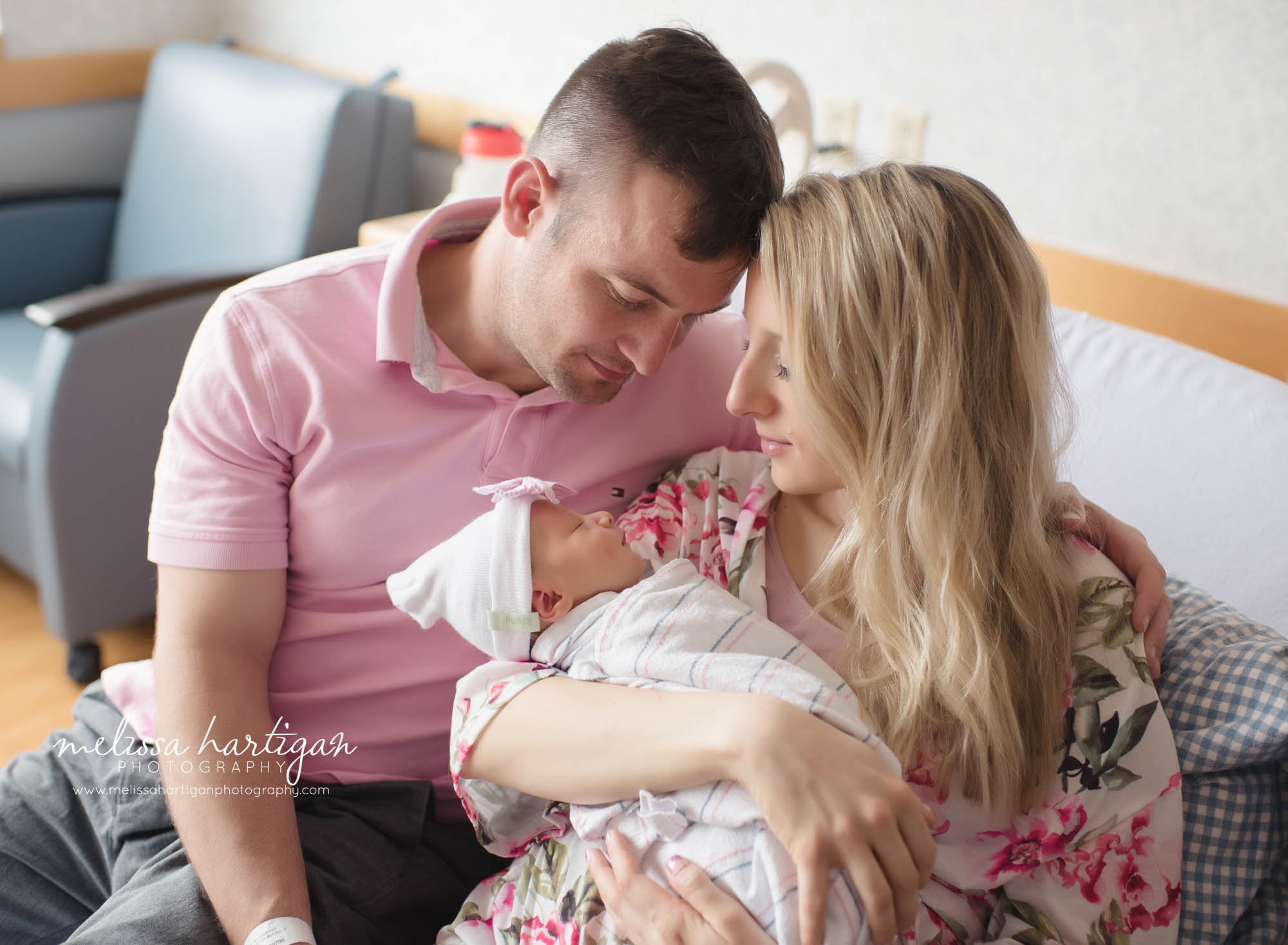 mom dad holding newborn daughter family pose fresh48 hospital photographer CT