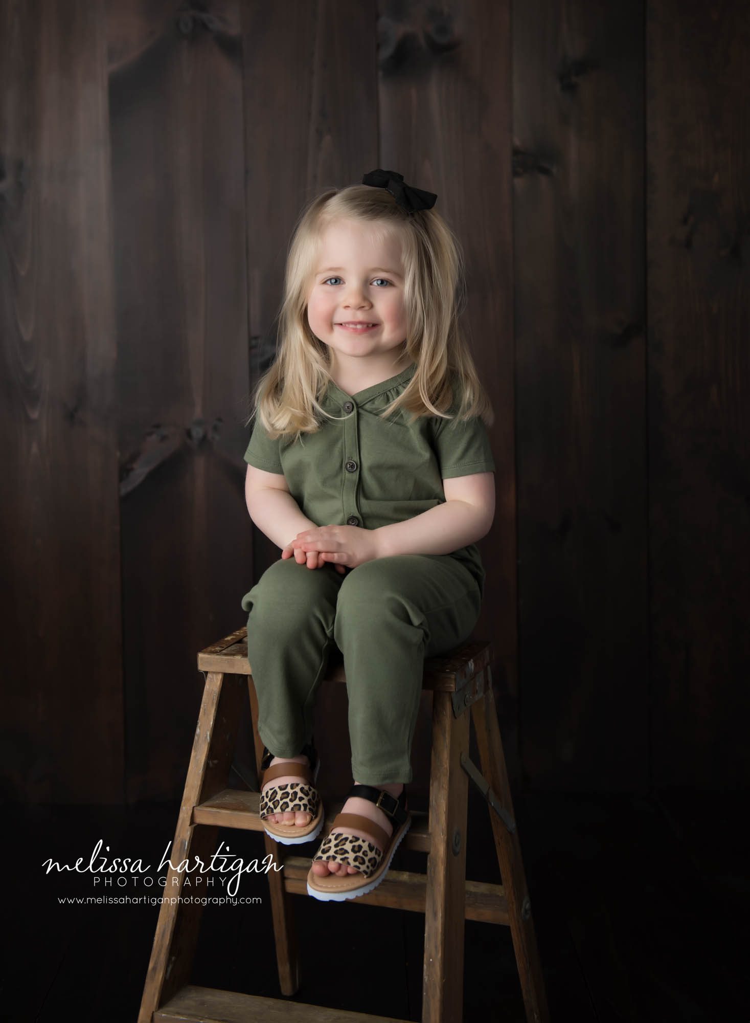 little girl sitting on step stool in studio photoshoot tolland CT children photography