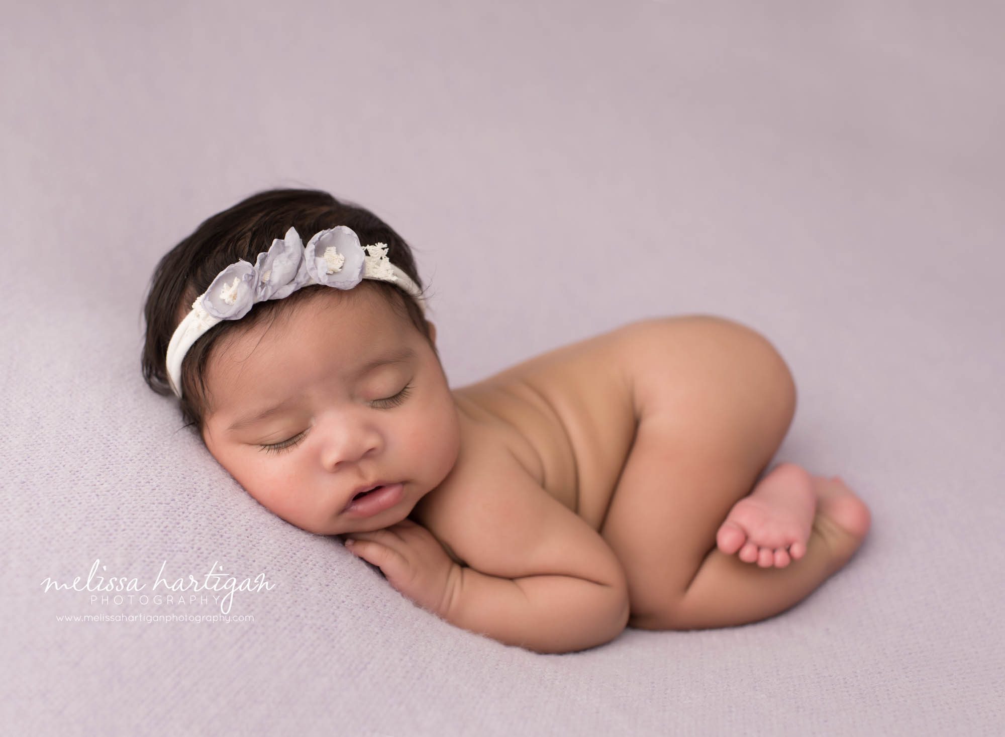 newborn baby girl posed on tummy new haven county CT newborn photography