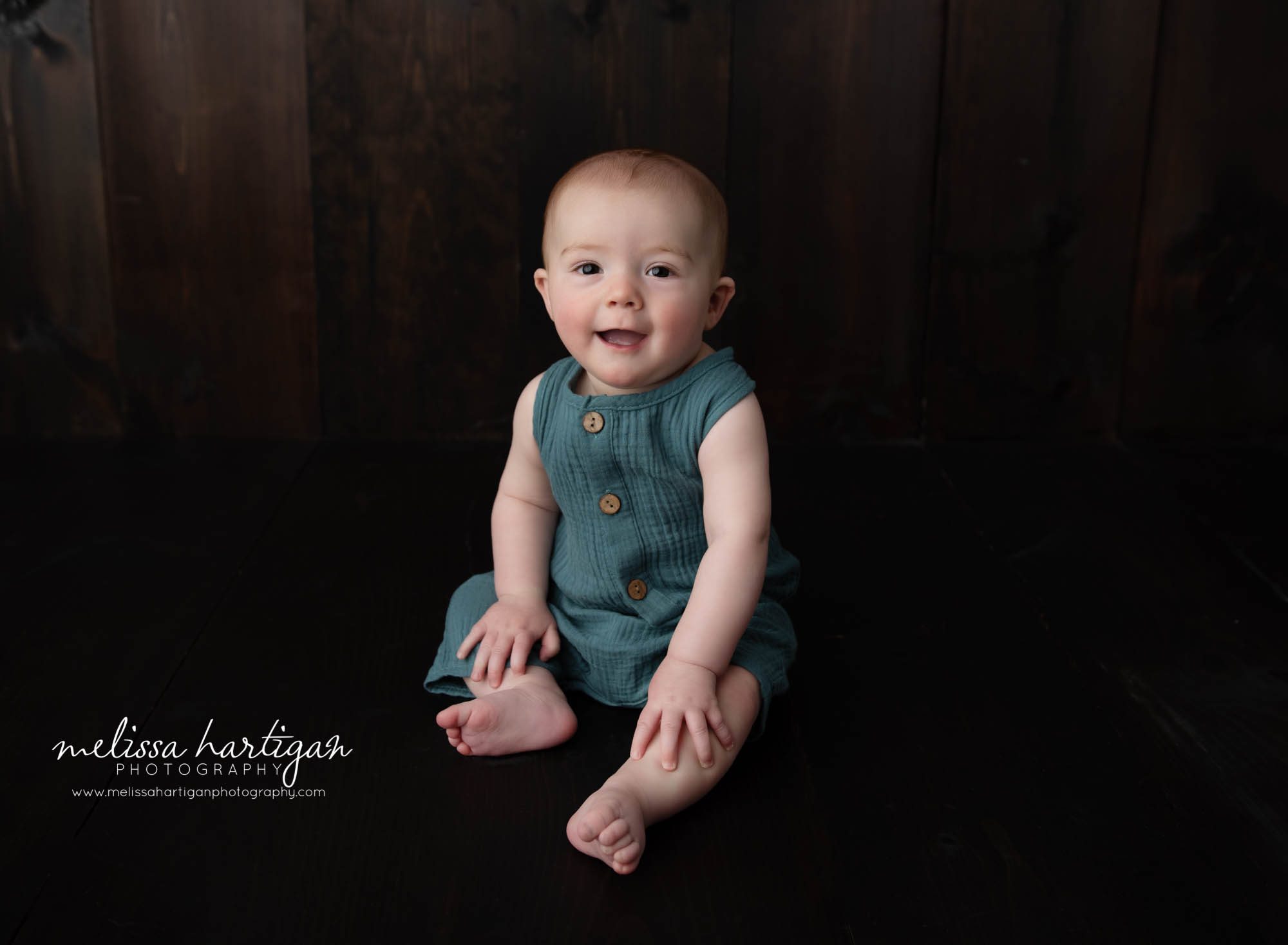 happy smiley baby boy wearing teal baby milestone outfit CT photography