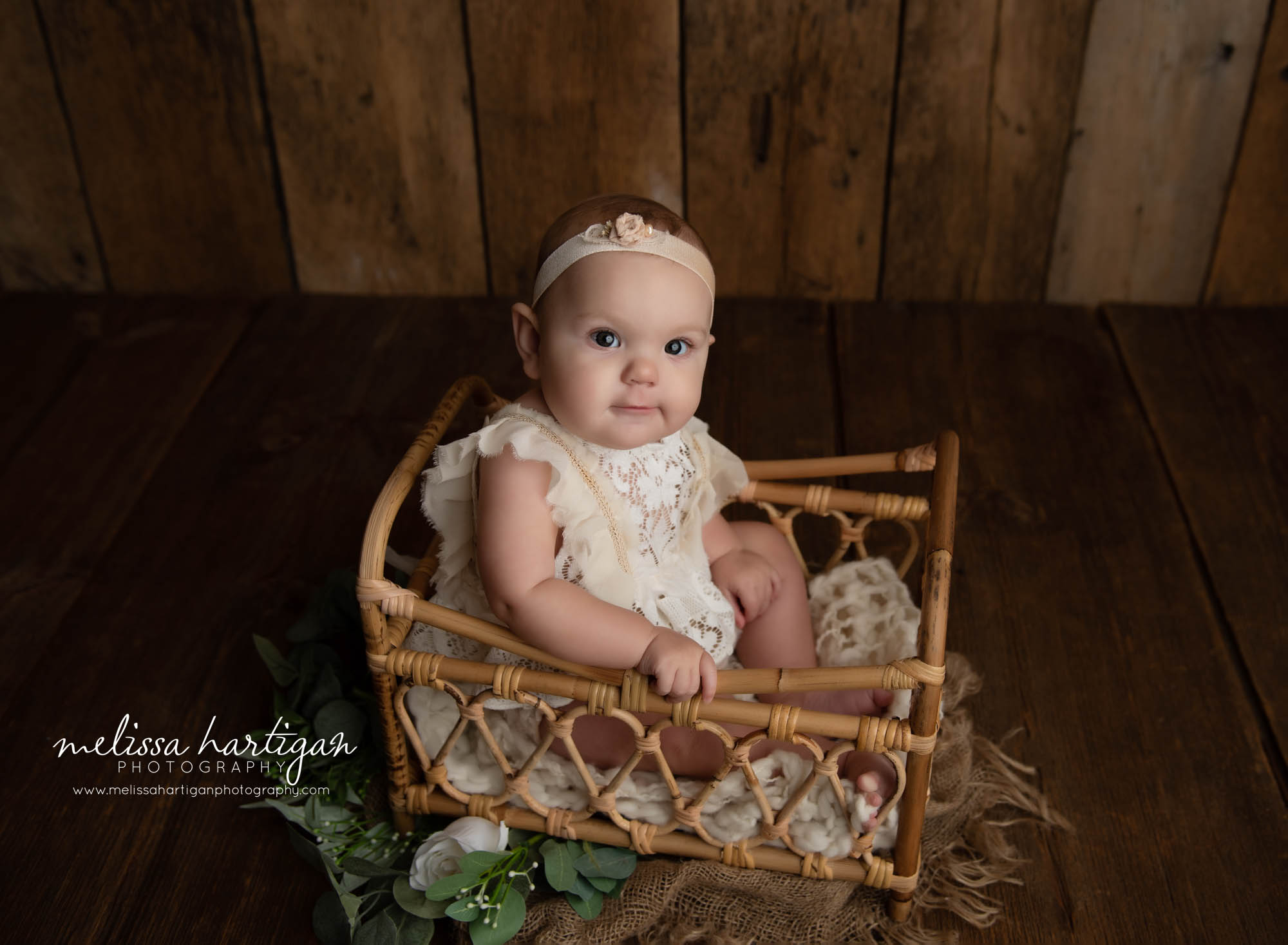 baby girl sitting in basket  milestone photography photoshoot