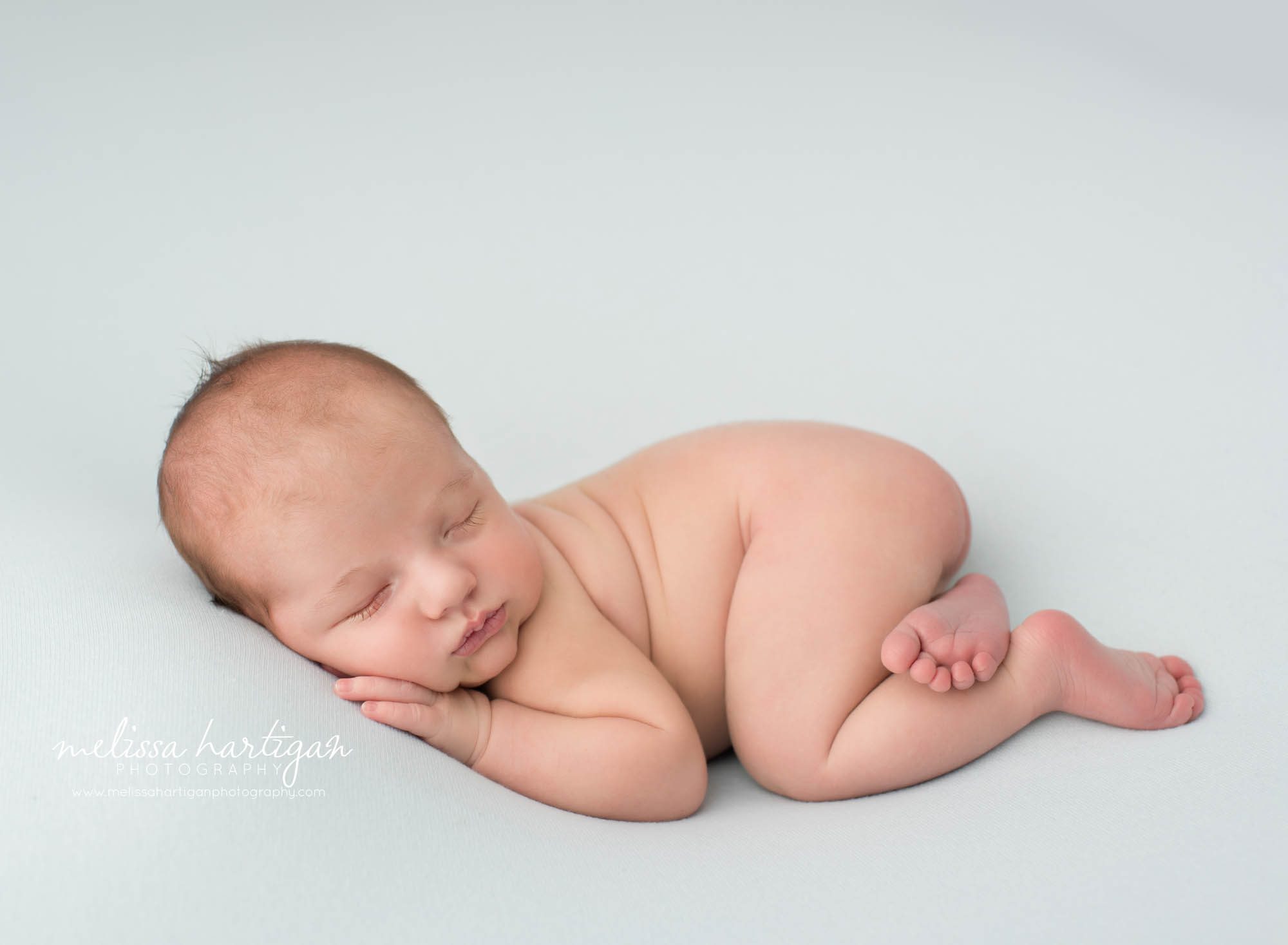 newborn baby boy posed on tummy newborn photography Wethersfield CT