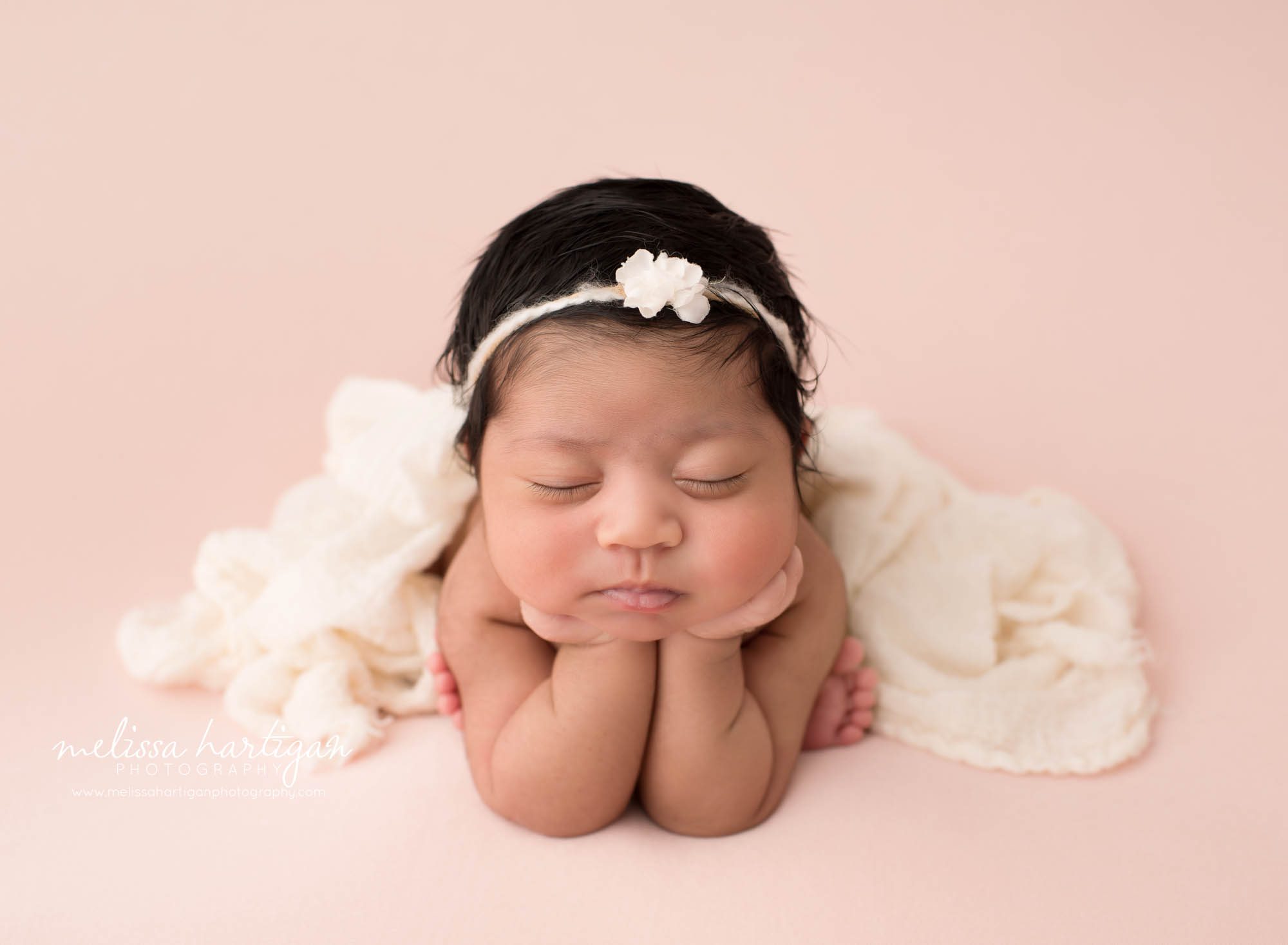 Newborn baby girl posed froggy pose Newborn Photography Manchester CT