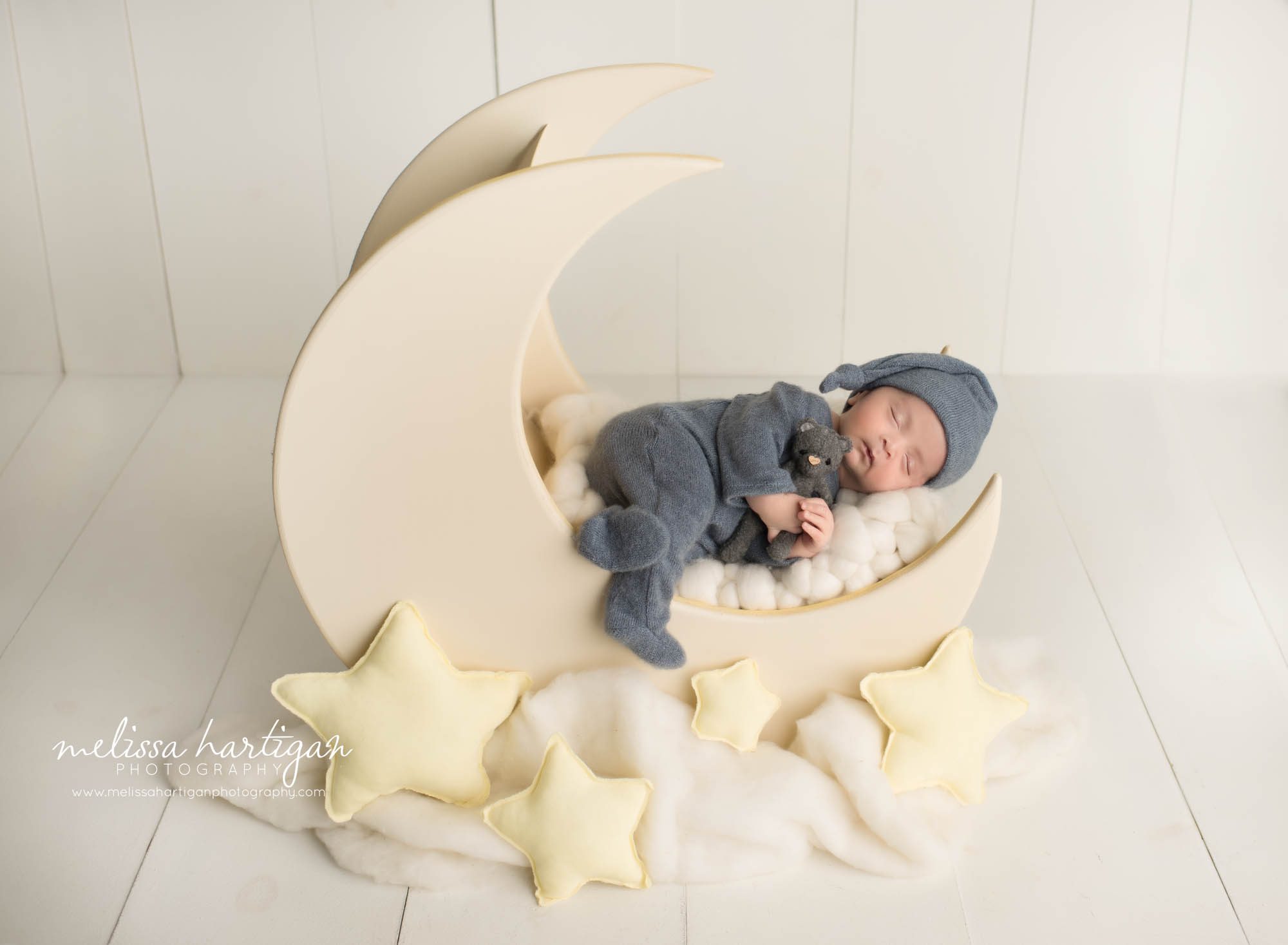 Newborn baby boy posed on moon prop sleeping Manchester CT Newborn Photography