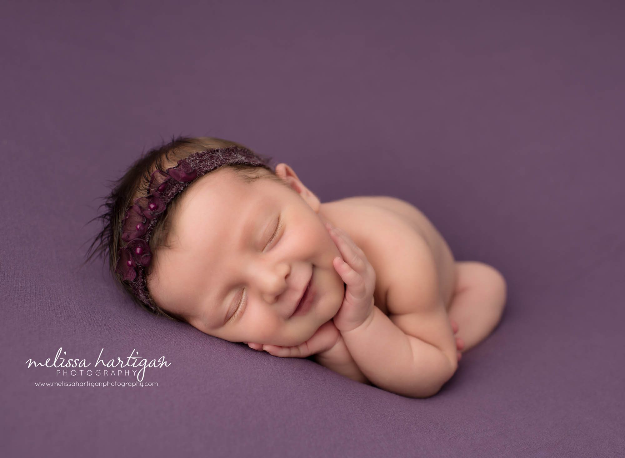 Newborn baby girl posed timber pose smiling Vernon CT Newborn Photography