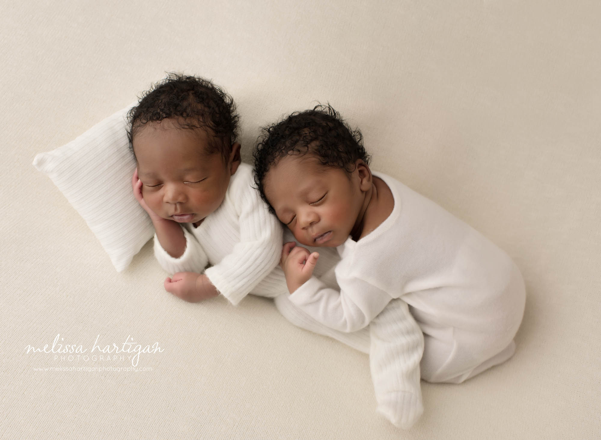Twin boys posed together sleeping on their side Newborn Photography Durham CT