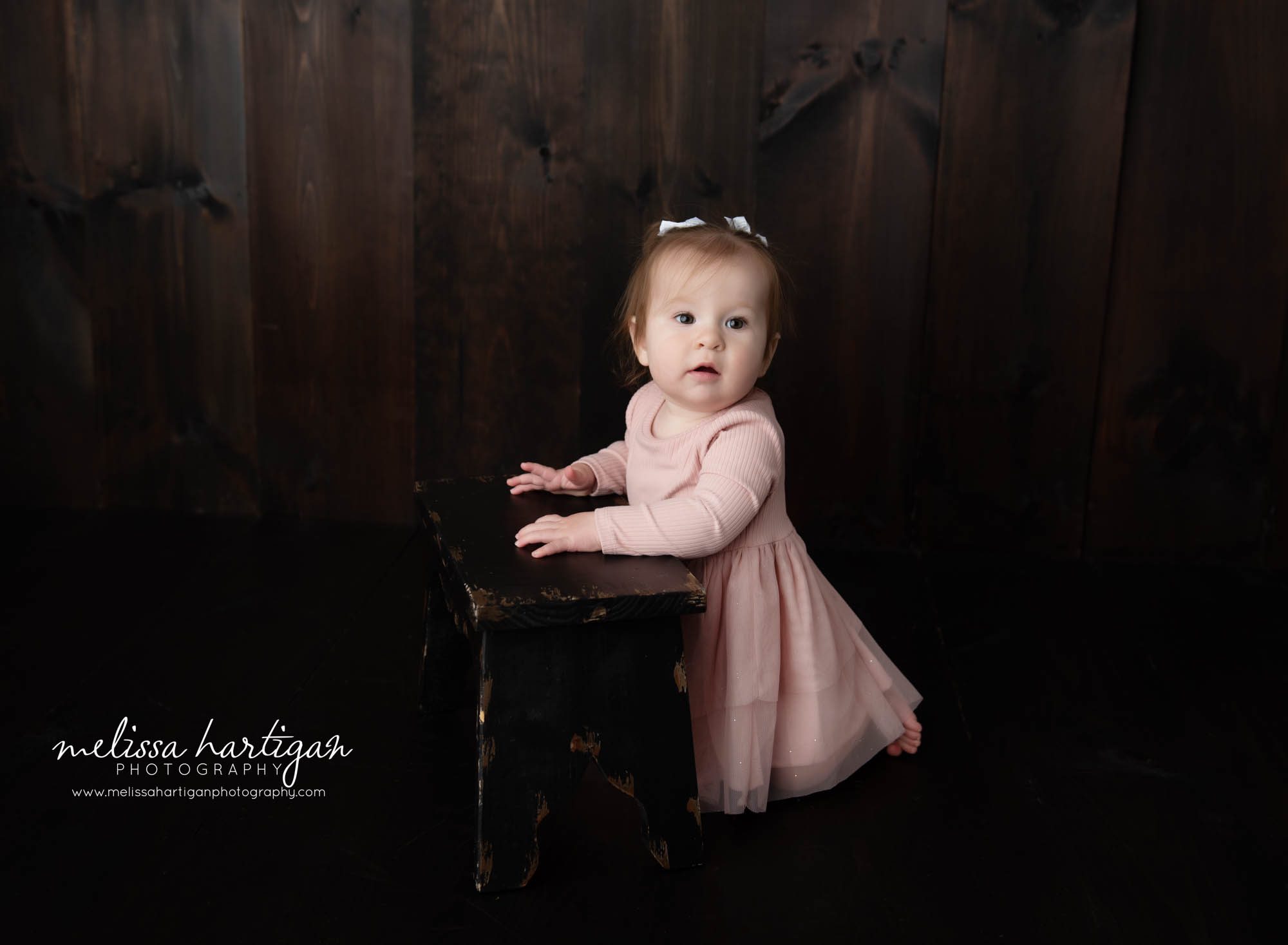 Baby girl standing at wooden stool Preston CT Baby Photography