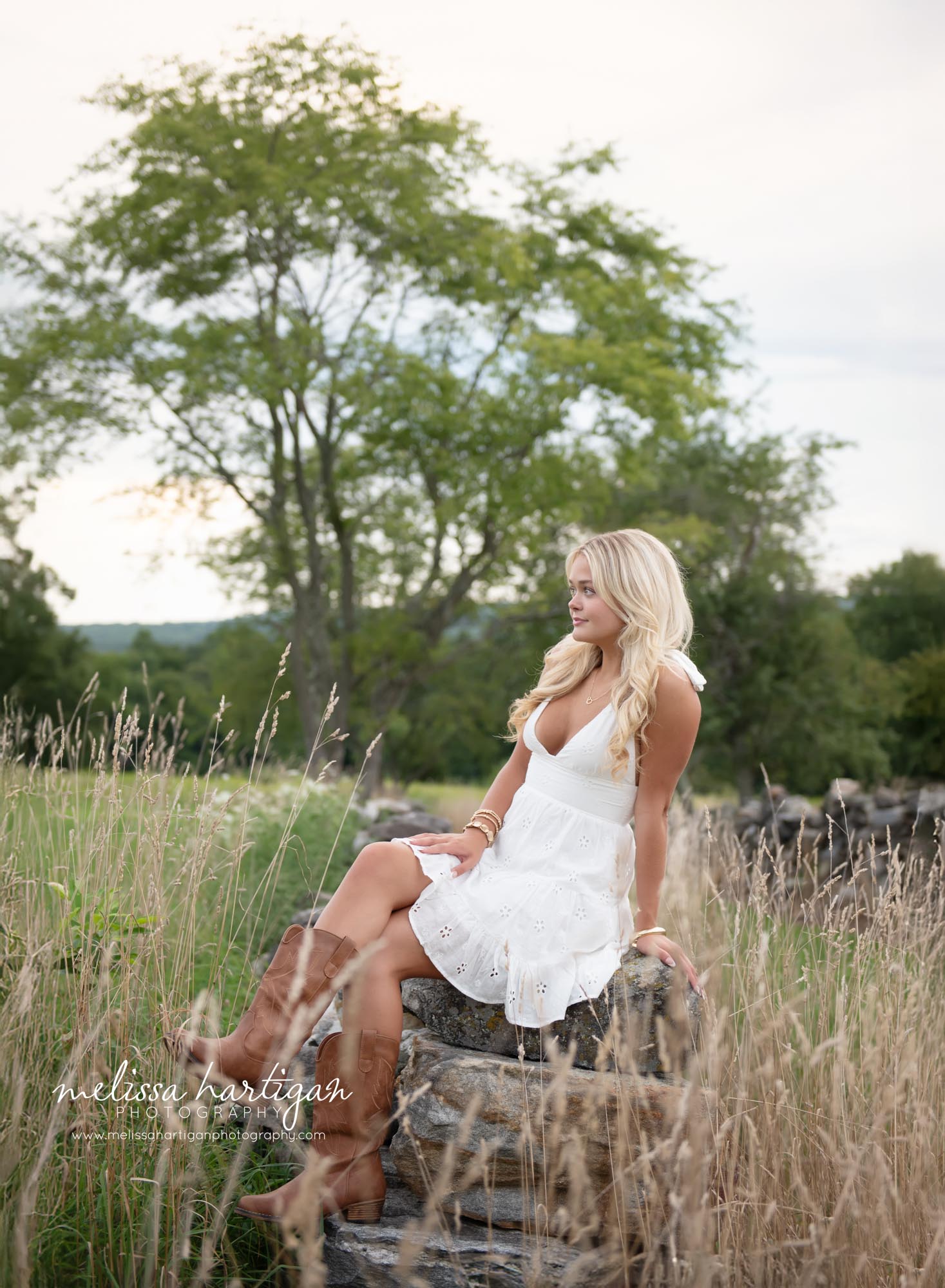 Teenage girl sitting on rocks Coventry CT Senior Photography