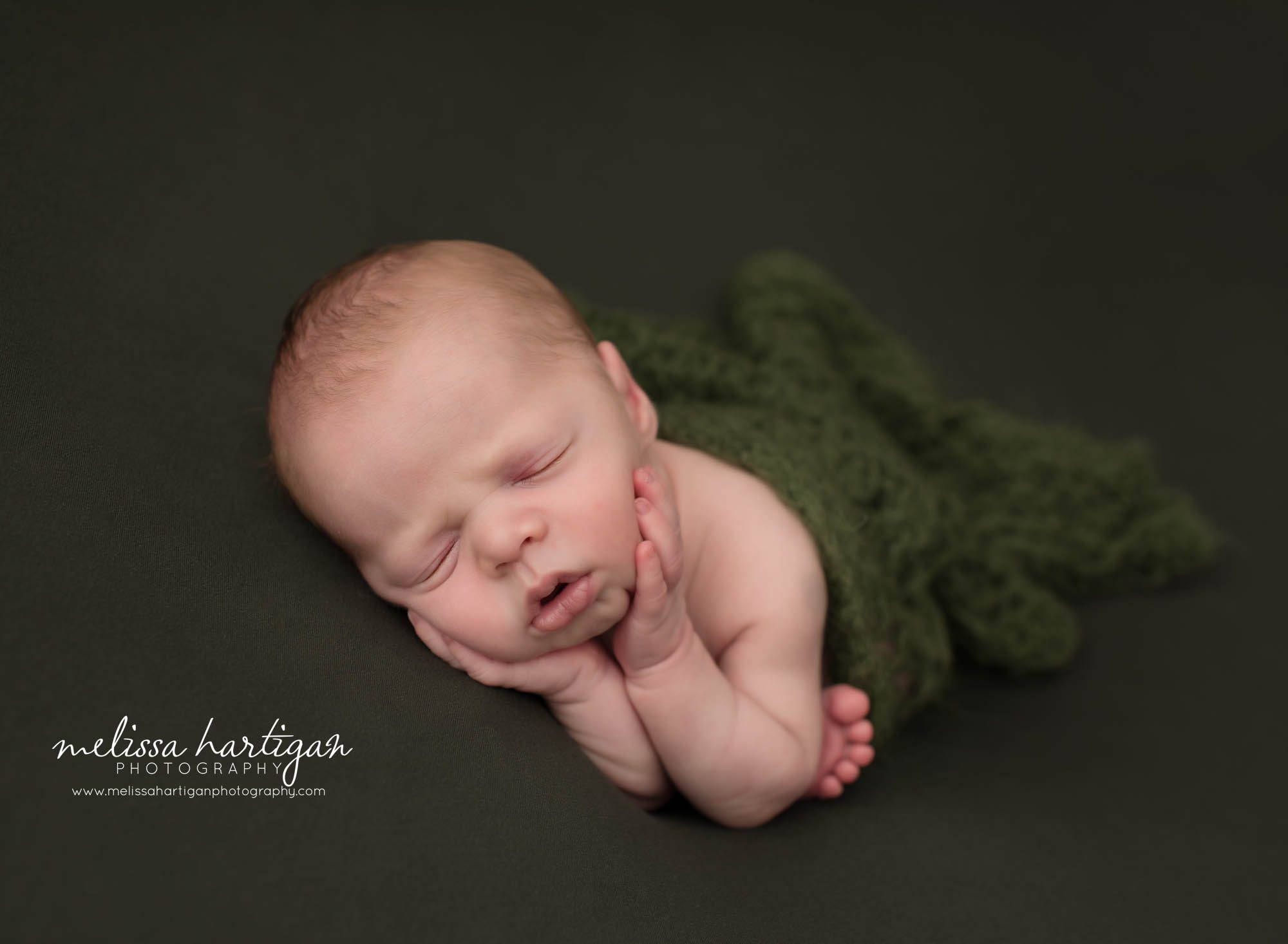 Newborn baby boy posed timber pose